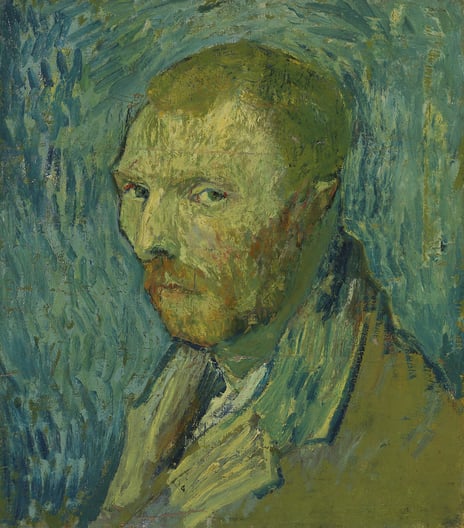 Self portrait of sad man in blue and green