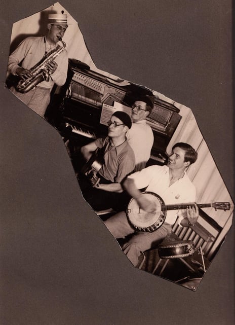Smiling people playing instruments together