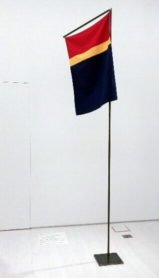 Persen’s 1977 cloth flag mounted at documenta 14 in Athens Synnøve Persens Sami flag on small black pole.