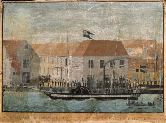 Constitutionen legg til kai i Christiania, 17. mai 1829. Mathias Ferslev Dalager, «Tollbubryggen», 1829. Illustrasjon av eit dampskip som legg til kai, på kaien står ei folkemengd.