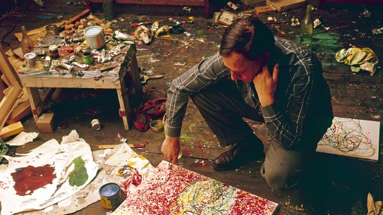Asger Jorn in his studio at 143 Boulevard de la Gare, Paris.