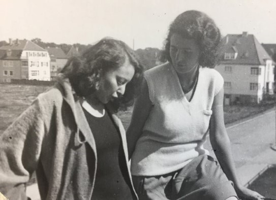 Otti Berger and a friend on a Bauhaus Dessau balcony, 1931-32. Two women on a balcony, black-and-white photo