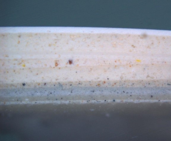 A cross-section of one of the side panels showing that the kitchen has undergone many rounds of renovation – and repaintings.