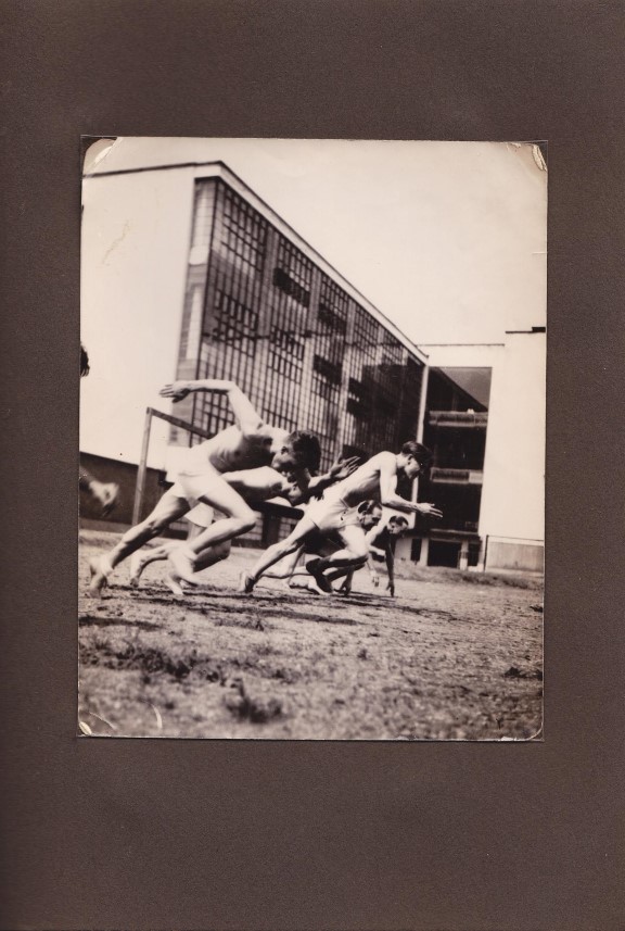 Men racing each other in the 1930s